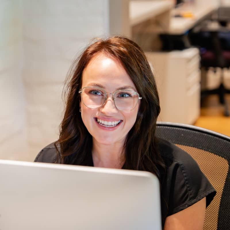 team member smiling with patient